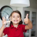girl happy with water pressure